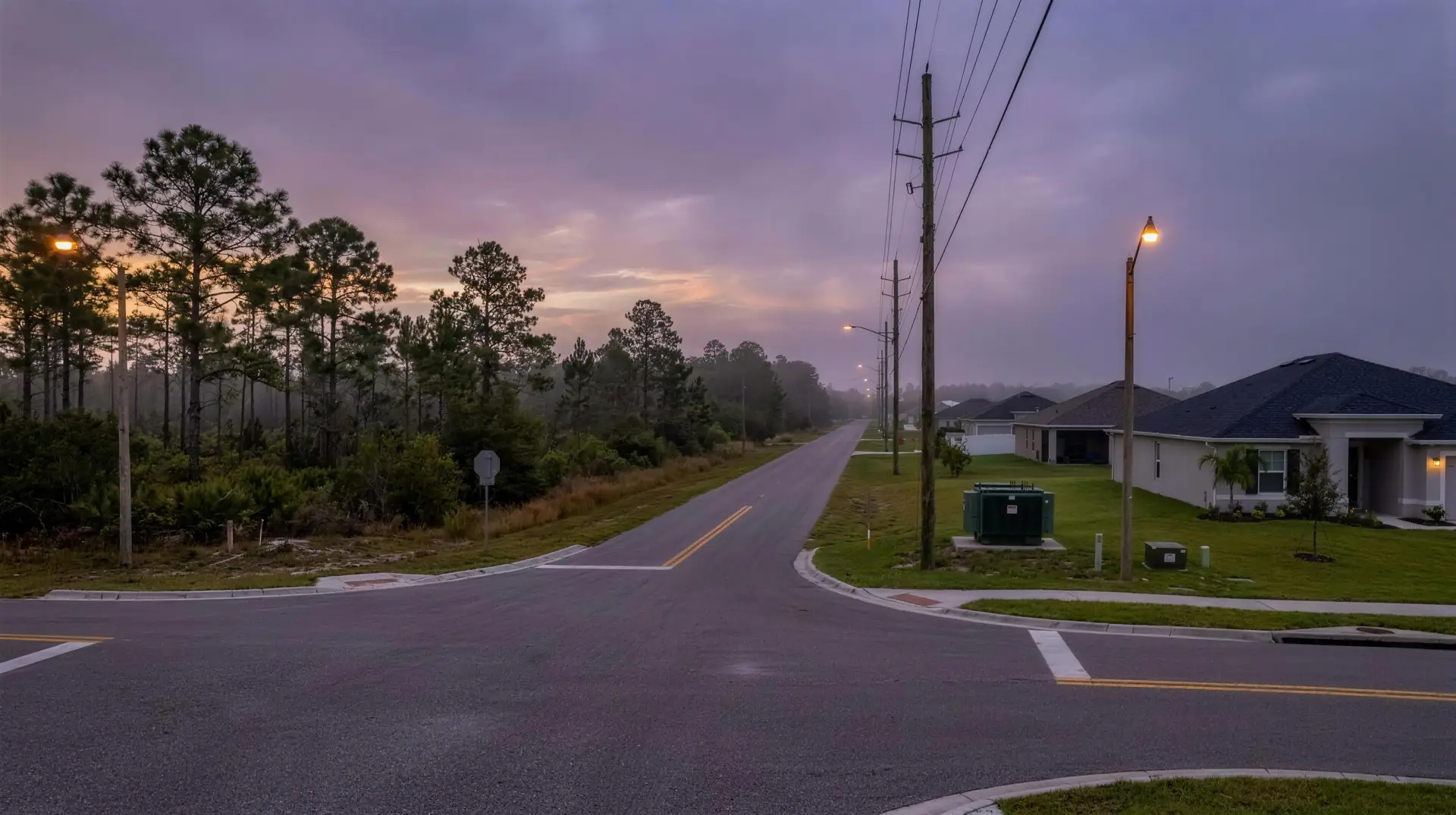 Rural to suburban crossroads with overhead power lines near Lecanto, Florida